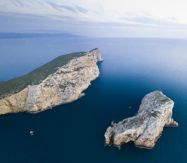 Aerial view of the rocky promontory of Capo Caccia, Alghero,  Sassari district, Sardinia, Italy.
