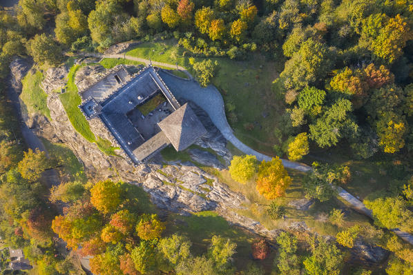 Aerial view of the medieval Bellinzona castles, Unesco World Heritage site, in autumn at sunset. Canton Ticino, Switzerland.