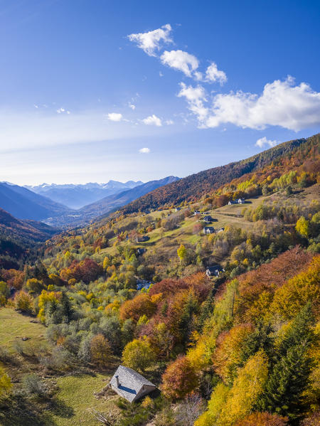 Aerial view of the autumnal colors at the Alpe Blitz mountain pasture looking towards Vigezzo valley. Craveggia, Valle Vigezzo, val d'Ossola, Verbano Cusio Ossola, Piedmont, Italy.