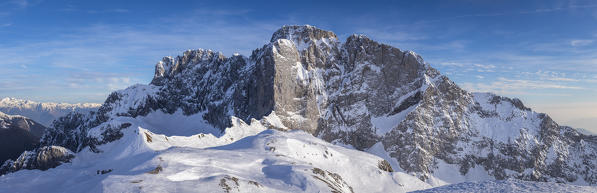 Panoramic view of the snow-covered north face of the Presolana mountain in winter. Colere, Val di Scalve, Bergamo district, Lombardy, Italy, Southern Europe.