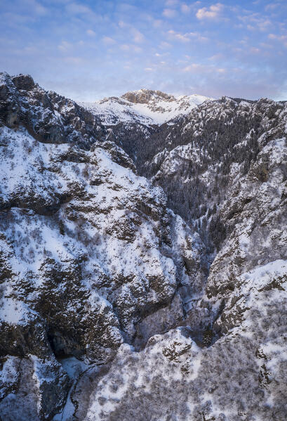 Aerial view of the Presolana and Valle dei Mulini gorge from the small church called San Peder. Rusio, Castione della Presolana, Val Seriana, Bergamo district, Lombardy, Italy.
