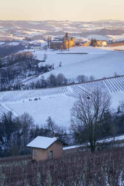Sunset on the Castello di La Volta in winter from La Morra. Barolo, Barolo wine region, Langhe, Piedmont, Italy, Europe.