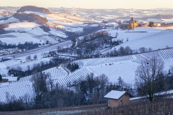 Sunset on the Castello di La Volta in winter from La Morra. Barolo, Barolo wine region, Langhe, Piedmont, Italy, Europe.