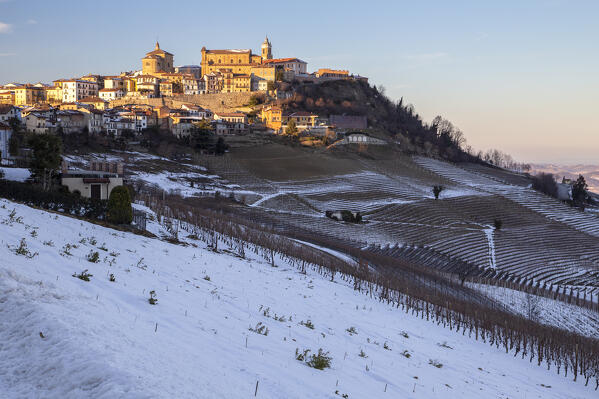 Winter sunset on La Morra village, Langhe, Cuneo district, Piedmont, Italy.