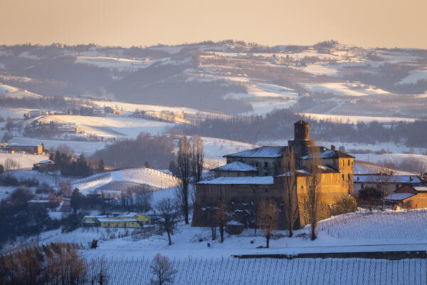 Sunset on the Castello di La Volta in winter. Barolo, Barolo wine region, Langhe, Piedmont, Italy, Europe.