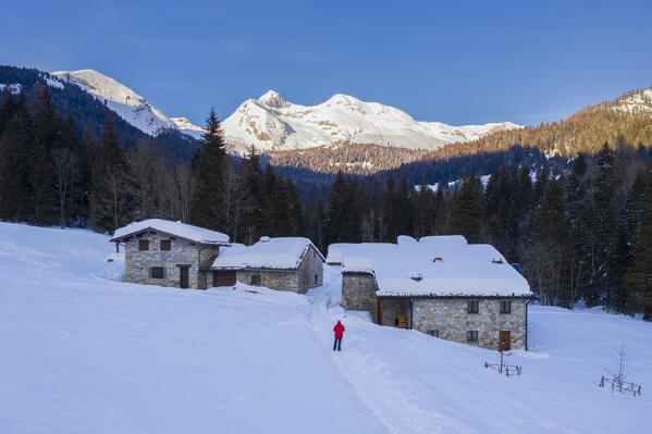 Aerial view of the Ferrante and Ferrantino mountains during a winter sunset from Baite del Moschel, Oltressenda Alta, Valzurio, Val Seriana, Bergamo district, Lombardy, Italy.