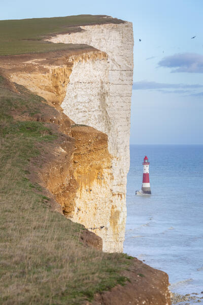 View of Beachy Head, a chalk headland in East Sussex, immediately east of the Seven Sisters and it's lighthouse. Eastbourne, East Sussex, Southern England.