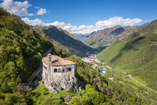 Aerial view of the San Patrizio sanctuary on a hill overlooking Casnigo and Valle Seriana. Val Seriana, Bergamo province, Lombardy, Italy.