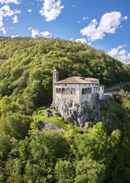Aerial view of the San Patrizio sanctuary on a hill overlooking Casnigo and Valle Seriana. Val Seriana, Bergamo province, Lombardy, Italy.
