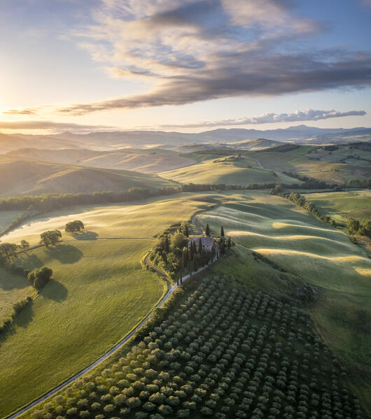 Aerial view of the famous Podere Belvedere and the surrounding countryside at sunrise. San Quirico d'Orcia, Val d'Orcia, Tuscany, Italy.
