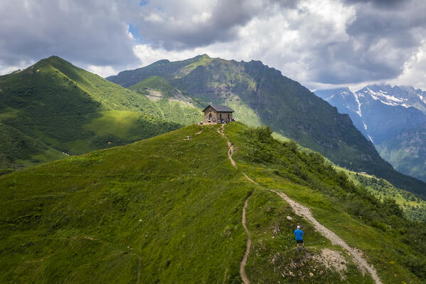 Aerial view of the small church at the top of the Manina Pass, between Scalve Valley and Seriana Valley. Nona,  Vilminore di Scalve, Scalve Valley, Lombardy, Bergamo province, Italy.