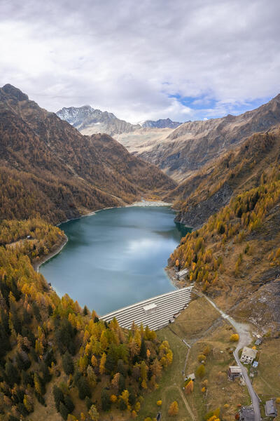 View of Lago dei Cavalli and it's dam with Pizzo d'Andolla. Alpe Cheggio, Antrona Valley, Piedmont, Verbano Cusio Ossola, Italy.