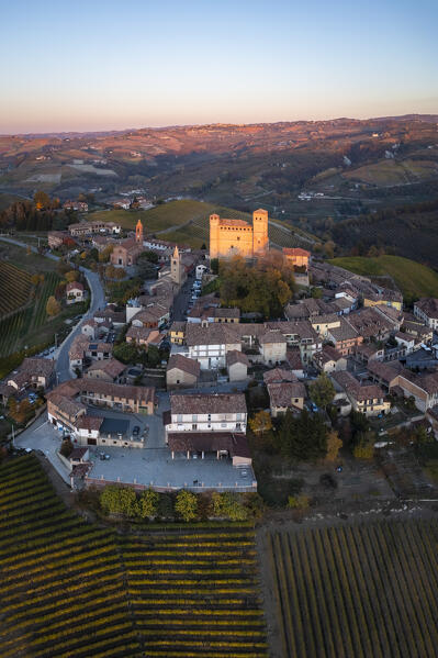 Aerial view of the medieval town of Serralunga d'Alba and its castle in autumn. Serralunga d'Alba, Langhe, Piedmont, Italy, Europe.