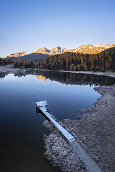 View of Staz Lake near St. Moritz at dawn. Lej da Staz, St. Moritz, canton of Graubünden, Engadine, Switzerland.
