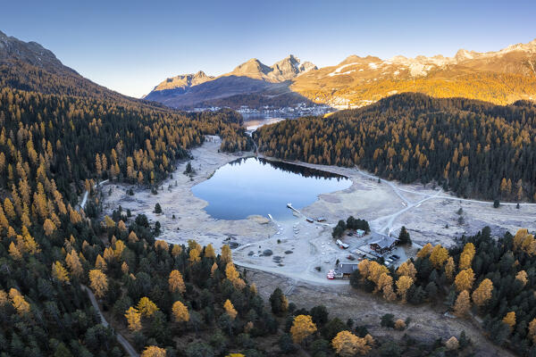 View of Staz Lake near St. Moritz Lake at dawn. Lej da Staz, St. Moritz, canton of Graubünden, Engadine, Switzerland.