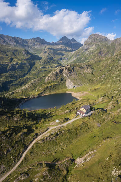 View of the Rifugio Calvi and Lake Rotondo during summer. Carona, Val Brembana, Alpi Orobie, Bergamo, Bergamo Province, Lombardy, Italy, Europe.