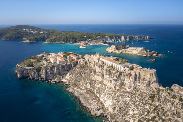 View of the Santuario di Santa Maria a Mare on the top of  Isola san Nicola with Cretaccio and Isola san Domino on the background. Tremiti Islands, Foggia district, Puglia, Italy.