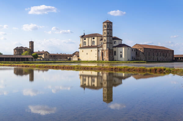 View of reflecting clouds on the rice fields of the Principality of Lucedio. Trino Vercellese, Vercelli district, Piedmont, Italy.