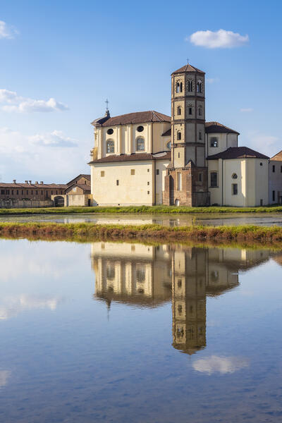 View of reflecting clouds on the rice fields of the Principality of Lucedio. Trino Vercellese, Vercelli district, Piedmont, Italy.