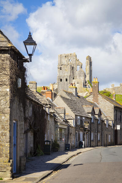 View of the old town and the ruins of Corfe Castle. Dorset, England, United Kingdom.