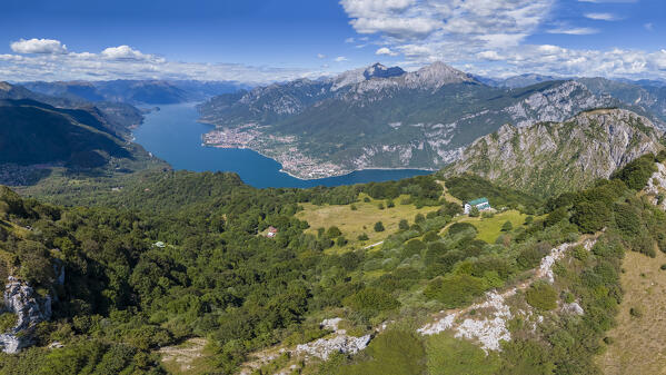 Aerial view of Rifugio Sev dominating on Como Lake (Lecco branch) and located below Corni di Canzo mountains. Valbrona, Como district, Lombardy, Italy, Europe