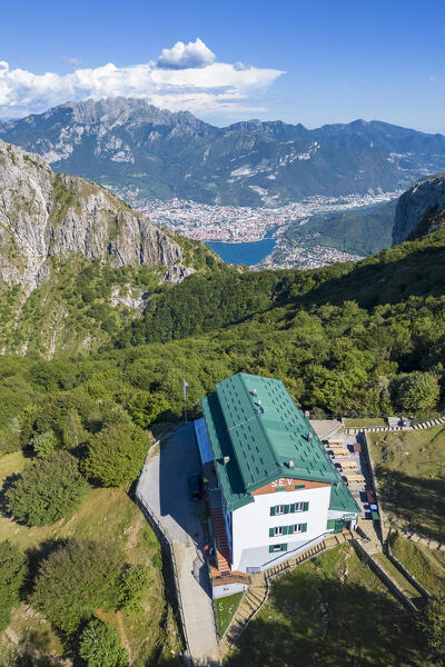 Aerial view of Rifugio Sev dominating on Como Lake (Lecco branch) and located below Corni di Canzo mountains. Valbrona, Como district, Lombardy, Italy, Europe
