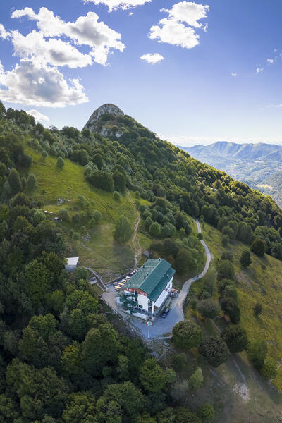 Aerial view of Rifugio Sev dominating on Como Lake (Lecco branch) and located below Corni di Canzo mountains. Valbrona, Como district, Lombardy, Italy, Europe