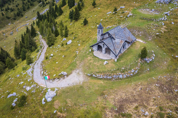 Aerial view of the Chiesetta degli Alpini church and Cima Moren of Pizzo Camino. Borno, Valcamonica, brescia district, Lombardy, Italy.