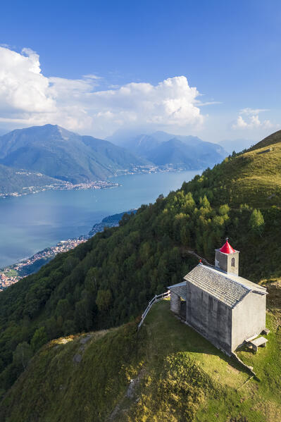 Aerial view of the church of San Bernardo on the mounts over Musso overlooking Lake Como. Musso, Como district, Lake Como, Lombardy, Italy. 