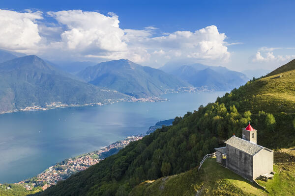 Aerial view of the church of San Bernardo on the mounts over Musso overlooking Lake Como. Musso, Como district, Lake Como, Lombardy, Italy. 