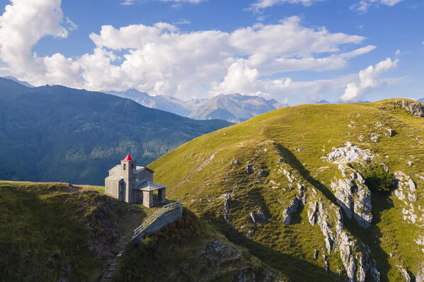 Aerial view of the church of San Bernardo on the mounts over Musso. Musso, Como district, Lake Como, Lombardy, Italy. 