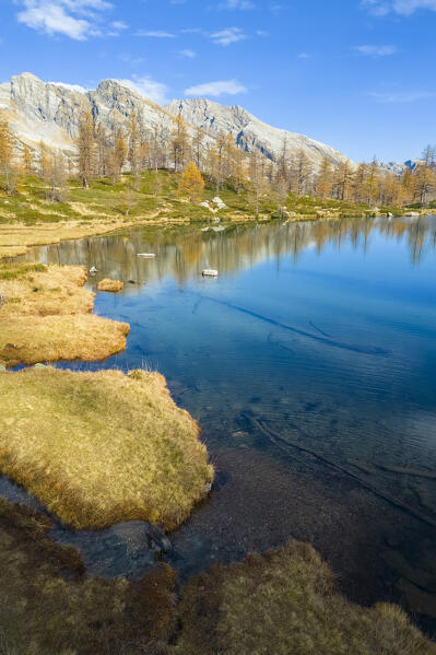 Aerial view of the Ragozza lake in autumn. Bognanco, Val Bognanco, Piedmont, Italy.