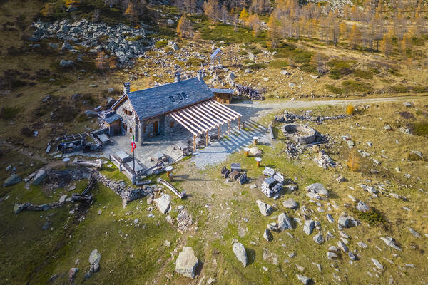 Aerial view of Gattascosa refuge near Monscera pass in autumn. Bognanco, Val Bognanco, Piedmont, Italy.