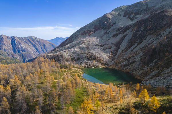 Aerial view of the Ragozza lake in autumn. Bognanco, Val Bognanco, Piedmont, Italy.