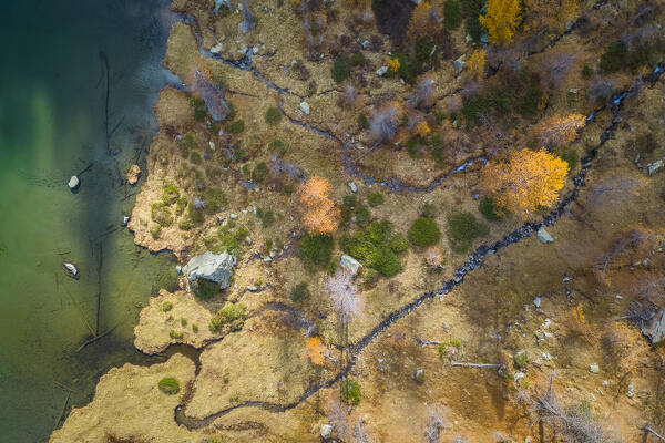 Aerial view of the Ragozza lake in autumn. Bognanco, Val Bognanco, Piedmont, Italy.