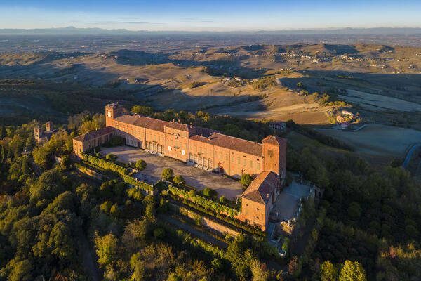 Aerial view of the Montalto castle on a hill overlooking all of Oltrepo Pavese. Montalto Pavese, Oltrepo Pavese, Pavia district, Lombardy, Italy.
