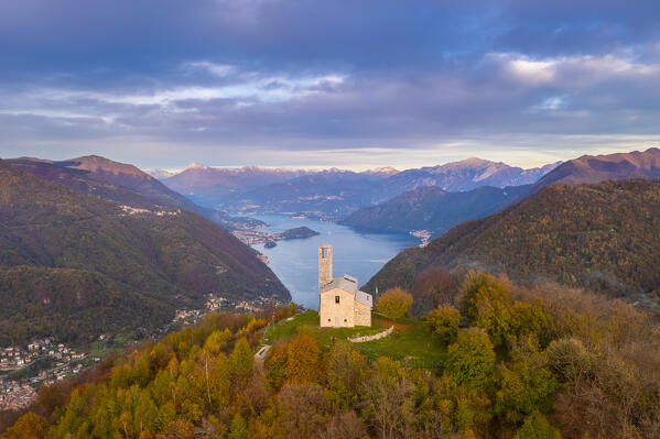 Sunset over Lake Como viewed from San Zeno hermitage on the top of Intelvi Valley in autumn. Cerano d'Intelvi, Como distric, Lake Como, Lombardy, Italy.