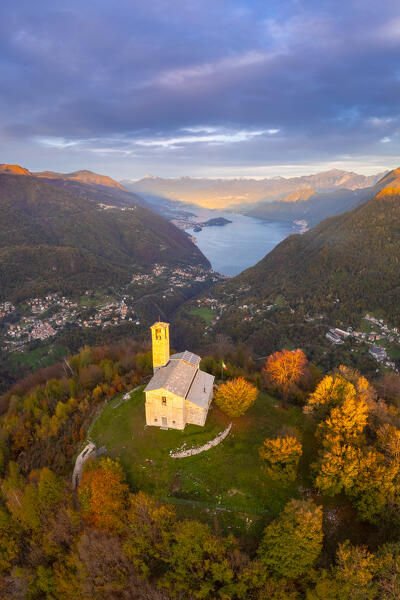 Sunset over Lake Como viewed from San Zeno hermitage on the top of Intelvi Valley in autumn. Cerano d'Intelvi, Como distric, Lake Como, Lombardy, Italy.