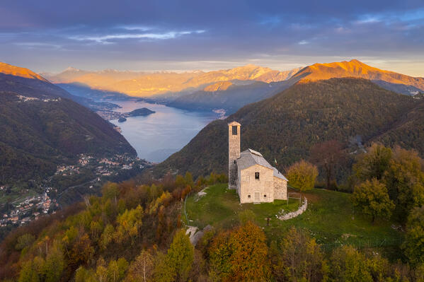 Sunset over Lake Como viewed from San Zeno hermitage on the top of Intelvi Valley in autumn. Cerano d'Intelvi, Como distric, Lake Como, Lombardy, Italy.