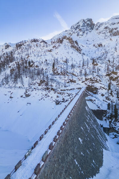 Winter view of Fregabolgia dam and lake. Carona, Val Brembana, Alpi Orobie, Bergamo, Bergamo Province, Lombardy, Italy, Europe.