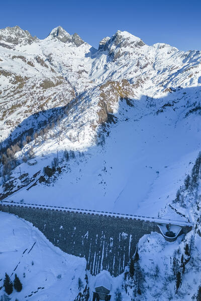 Winter view of Fregabolgia dam and lake. Carona, Val Brembana, Alpi Orobie, Bergamo, Bergamo Province, Lombardy, Italy, Europe.