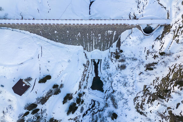 Winter view of Fregabolgia dam and lake. Carona, Val Brembana, Alpi Orobie, Bergamo, Bergamo Province, Lombardy, Italy, Europe.