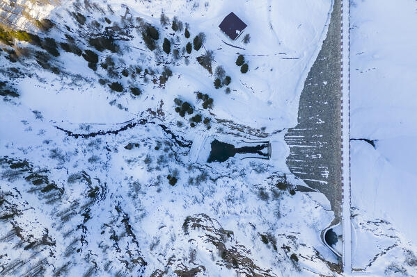 Winter view of Fregabolgia dam and lake. Carona, Val Brembana, Alpi Orobie, Bergamo, Bergamo Province, Lombardy, Italy, Europe.