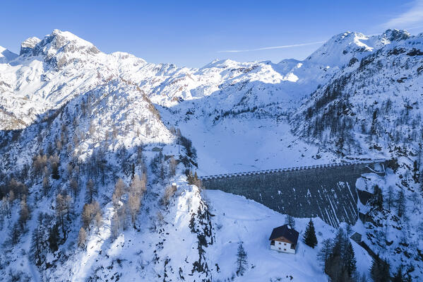 Winter view of Fregabolgia dam and lake. Carona, Val Brembana, Alpi Orobie, Bergamo, Bergamo Province, Lombardy, Italy, Europe.