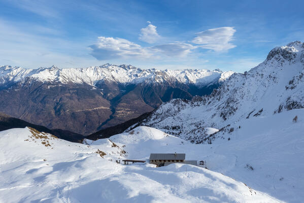 Aerial view of the Rifugio Campione from Monte Campioncino in winter. Cerveno, Val di Scalve, Brescia district, Lombardy, Italy, Southern Europe.
