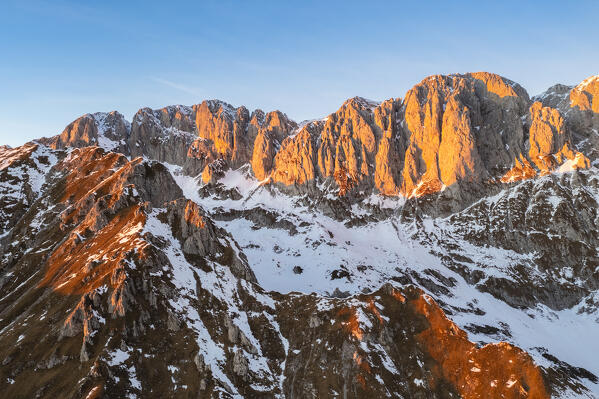 Aerial view of the Presolana mountain in winter at sunset. Val Seriana, Castione della Presolana, Bergamo district, Lombardy, Italy, Southern Europe.