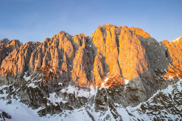 Aerial view of the Presolana mountain in winter at sunset. Val Seriana, Castione della Presolana, Bergamo district, Lombardy, Italy, Southern Europe.