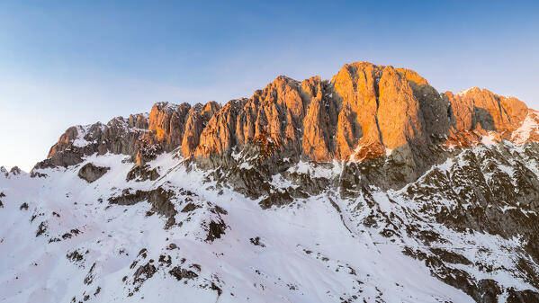Aerial view of the Presolana mountain in winter at sunset. Val Seriana, Castione della Presolana, Bergamo district, Lombardy, Italy, Southern Europe.