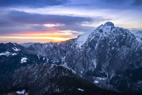 View of Malga Creisa and the Presolana east face at sunset in winter from Borno, Valcamonica. Borno, Valcamonica valley, Brescia province, Lombardy, Italy.