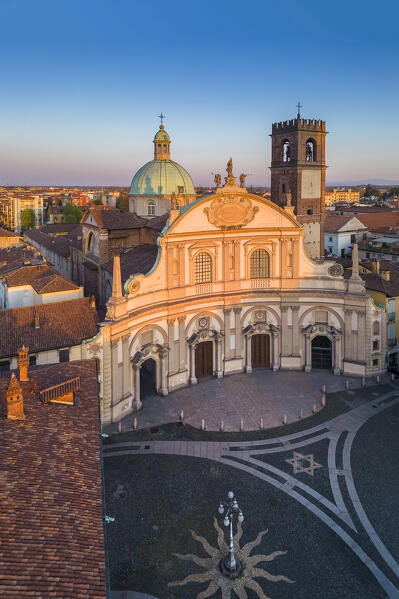 Aerial view of the Vigevano Cathedral and Piazza Ducale in spring at sunset. Vigevano, Lomellina, Province of Pavia, Lombardy, Italy.